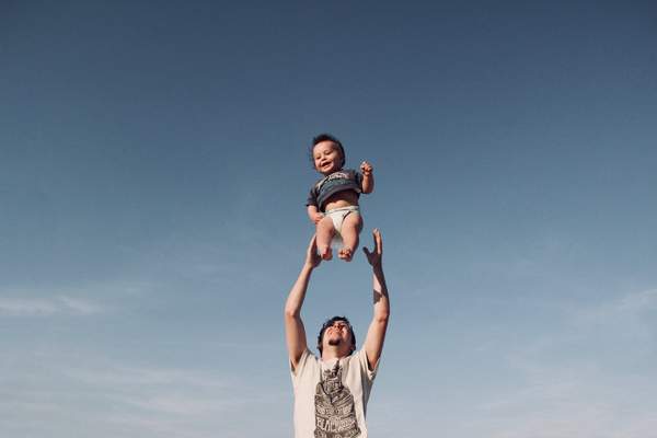 Happy kid with father