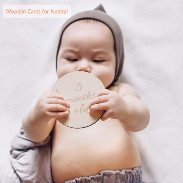Baby Holding Milestone Card