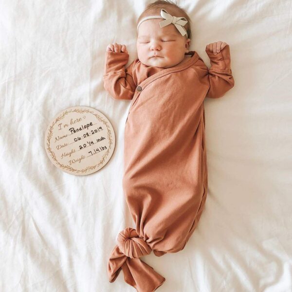 Baby Sleeping Next to Birth Card