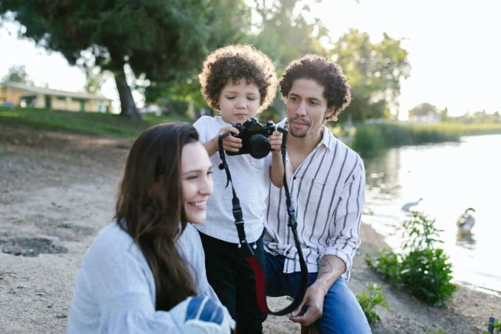 Ways to Bond With Your Children Outdoors - AmyandRose Parents and Kid in Park