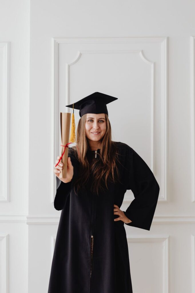 Mom holding a Degree